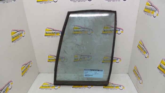 Usados Ventanilla triangular derecha detrás Mitsubishi Galant Precio € 26,25 Norma de margen ofrecido por Binckhorst BV