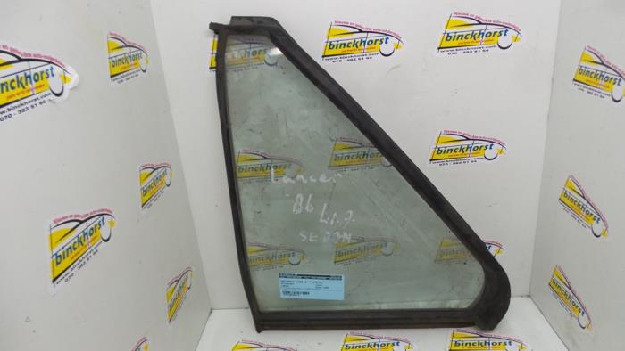 Usados Ventanilla triangular izquierda detrás Mitsubishi Lancer Precio € 26,25 Norma de margen ofrecido por Binckhorst BV