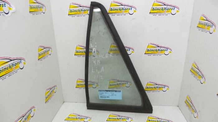Usados Ventanilla triangular izquierda detrás Mitsubishi Lancer Precio € 26,25 Norma de margen ofrecido por Binckhorst BV