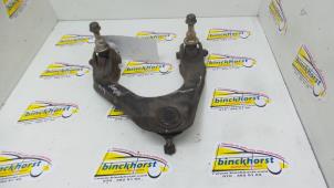 Usagé Bras de suspension haut avant gauche Honda Accord (CE7/8/9; CF1) 1.8i,iS 16V Prix € 36,75 Règlement à la marge proposé par Binckhorst BV