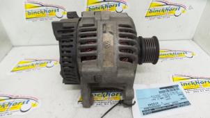 Dynamo från en Volkswagen Passat Variant (35I) 2.0i CL,GL,GT 1996