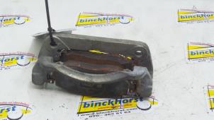 Used Front brake calliperholder, left Kia Picanto (BA) 1.1 12V Price € 26,25 Margin scheme offered by Binckhorst BV