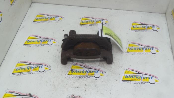 Rear brake calliperholder, left from a Ford Mondeo III 2.0 TDCi 130 16V 2002