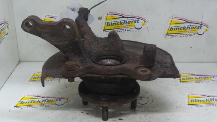 Knuckle, front right from a Mitsubishi Lancer (CK/CN/CP) 1.6i 16V 1995