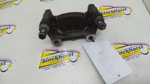 Used Rear brake calliperholder, right Opel Astra H SW (L35) 1.6 16V Twinport Price € 26,25 Margin scheme offered by Binckhorst BV