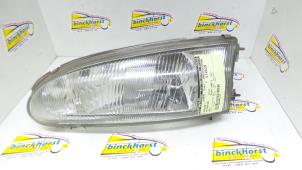 Used Headlight, left Mitsubishi Colt (CA/CC) 1.3 i GL,EL 12V Price € 26,25 Margin scheme offered by Binckhorst BV