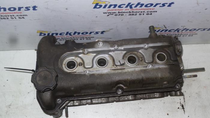 Cylinder head from a Suzuki Wagon-R+ (SR) 1.2 16V 1999