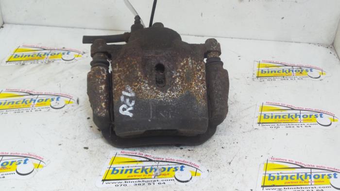 Front brake calliper, right from a Toyota Prius (NHW11L) 1.5 16V 2001