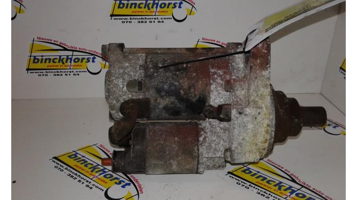 Anlasser van een Honda Accord (CC75/76) 2.0i 16V 1996