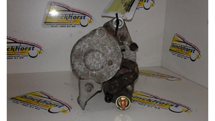 Anlasser van een Honda Accord (CC75/76) 2.0i 16V 1996
