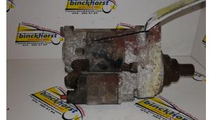 Anlasser van een Honda Accord (CC75/76) 2.0i 16V 1996