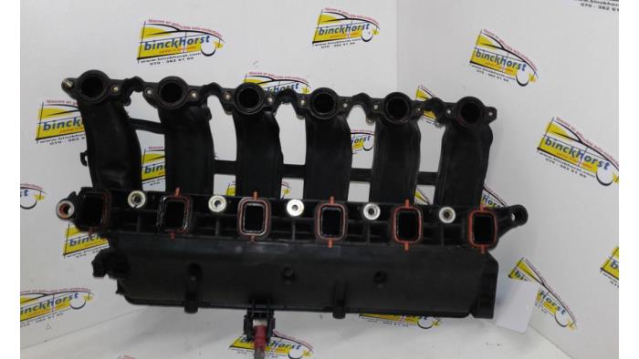 Intake manifold from a BMW 5 serie Touring (E39) 525d 24V 2000