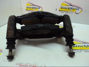 Used Front brake calliperholder, left Mitsubishi Carisma 1.6i 16V Price € 21,00 Margin scheme offered by Binckhorst BV