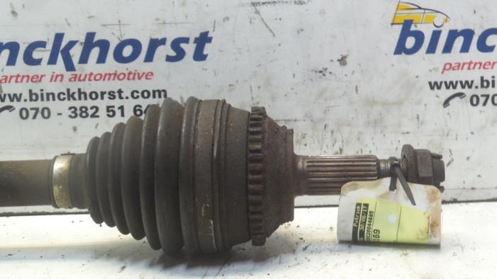 Front drive shaft, left from a Renault Megane Scénic (JA) 2.0 RT 1999