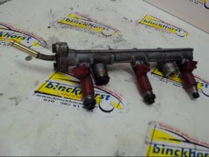Used Fuel injector nozzle Daihatsu Cuore (L251/271/276) 1.0 12V Price € 42,00 Margin scheme offered by Binckhorst BV