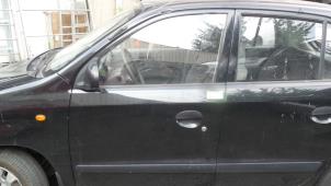 Używane Drzwi lewe przednie wersja 4-drzwiowa Hyundai Atos 1.0 12V Prime Cena € 105,00 Procedura marży oferowane przez Binckhorst BV