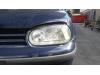Headlight, left from a Volkswagen Golf IV (1J1) 1.9 TDI 110 2000