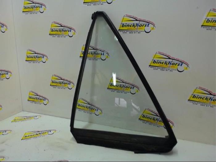 Usados Ventanilla triangular izquierda detrás Mazda 323 Fastbreak (BJ14) 2.0 DiTD 16V Precio € 31,50 Norma de margen ofrecido por Binckhorst BV