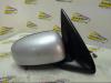 Wing mirror, right from a Nissan Almera (N16) 1.5 16V 2000
