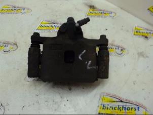 Used Front brake calliper, left Daihatsu Charade (G200/201/202/203/204) 1.3i TX/CX 16V Price € 31,50 Margin scheme offered by Binckhorst BV