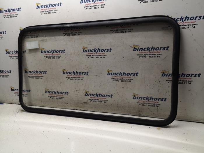 Window 2-door, rear left from a Ford Transit 2.5 Di Turbo 1998