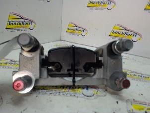 Used Rear brake calliperholder, left Mitsubishi Outlander (GF/GG) 2.0 16V PHEV 4x4 Price € 26,25 Margin scheme offered by Binckhorst BV