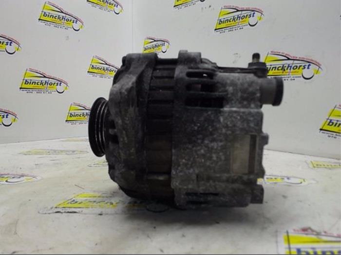 Dynamo van een Ford (USA) Probe II 2.0i 16V DOHC SEFI 1994