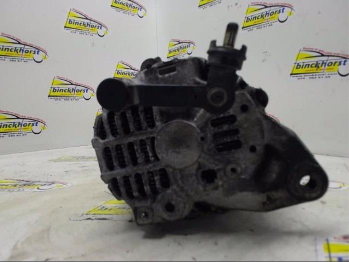 Dynamo van een Ford (USA) Probe II 2.0i 16V DOHC SEFI 1994