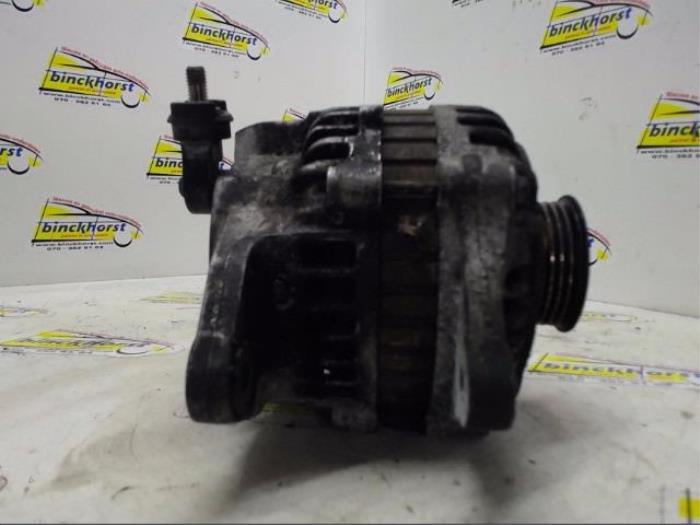 Dynamo van een Ford (USA) Probe II 2.0i 16V DOHC SEFI 1994