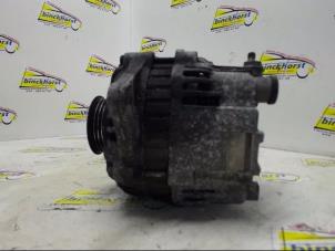 Dynamo van een Ford (USA) Probe II 2.0i 16V DOHC SEFI 1994