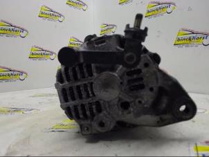 Dynamo van een Ford (USA) Probe II 2.0i 16V DOHC SEFI 1994