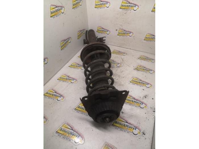 Rear shock absorber rod, left from a Ford Mondeo II 2.0i 16V E2/96 EEC 2000
