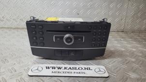 Usados Panel de control de radio Mercedes C (W204) 1.8 C-180 CGI 16V Precio € 100,00 Norma de margen ofrecido por kaslo auto parts