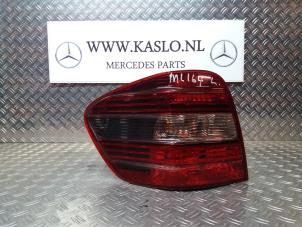 Used Taillight, left Mercedes ML II (164/4JG) 3.0 ML-320 CDI 4-Matic V6 24V Price € 75,00 Margin scheme offered by kaslo auto parts