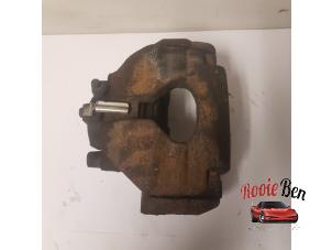 Used Front brake calliper, left Volkswagen Touareg (7LA/7L6) 2.5 TDI R5 Price € 60,00 Margin scheme offered by Rooie Ben autodemontage