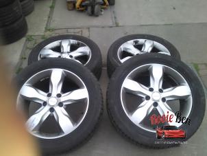 Used Set of wheels + tyres Jeep Grand Cherokee (WK/WK2) 3.0 CRD V6 24V Price on request offered by Rooie Ben autodemontage