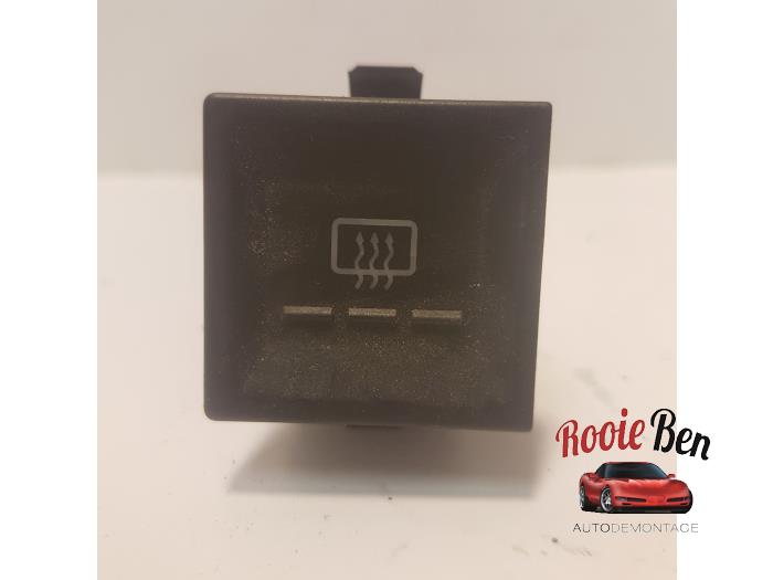 Bouton de dégivrage pare-brise