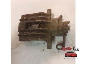 Used Rear brake calliper, left Volkswagen Polo V (6R) 1.4 16V Price on request offered by Rooie Ben autodemontage