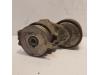 Drive belt tensioner from a Renault Scénic II (JM) 1.9 dCi 120 2005