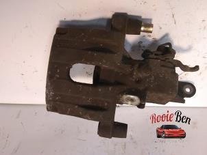 Used Rear brake calliper, left Nissan Primera Wagon (W12) 1.8 16V Price € 25,00 Margin scheme offered by Rooie Ben autodemontage
