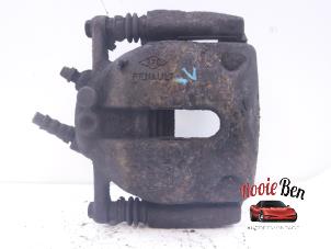 Used Front brake calliper, left Renault Kangoo Express (FW) 1.5 dCi 90 FAP Price on request offered by Rooie Ben autodemontage