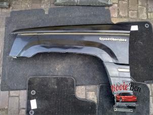 Used Front wing, left Jeep Grand Cherokee (ZJ) 5.2i V8 Price on request offered by Rooie Ben autodemontage