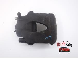 Used Front brake calliper, left Audi A3 Sportback (8PA) 1.6 TDI 16V Price on request offered by Rooie Ben autodemontage