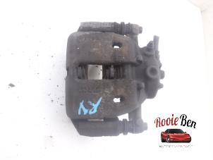 Used Front brake calliper, right Mitsubishi Colt (Z2/Z3) 1.1 12V Price € 35,00 Margin scheme offered by Rooie Ben autodemontage