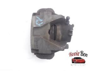 Used Front brake calliper, right Renault Megane III Coupe (DZ) 1.5 dCi 110 Price on request offered by Rooie Ben autodemontage