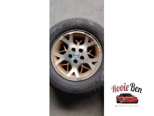 Used Wheel + winter tyre Jeep Grand Cherokee (ZJ) 5.2i V8 Price on request offered by Rooie Ben autodemontage