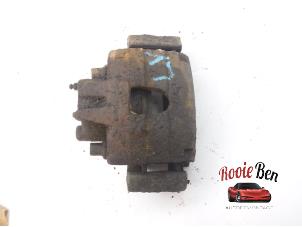 Used Front brake calliper, left Dodge Ram Van 2.5 CRD Kat. Price on request offered by Rooie Ben autodemontage