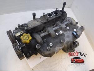 Used Cylinder head Chrysler Voyager/Grand Voyager (RG) 2.8 CRD 16V Autom. Price on request offered by Rooie Ben autodemontage
