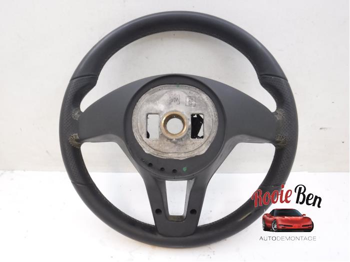Steering wheel from a Mercedes-Benz A (W176) 1.5 A-180 CDI, A-180d 16V 2014