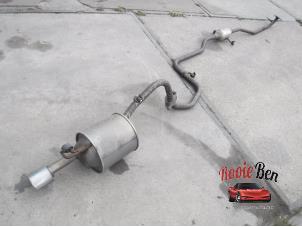 Used Exhaust central + rear silencer Toyota Yaris III (P13) 1.0 12V VVT-i Price on request offered by Rooie Ben autodemontage